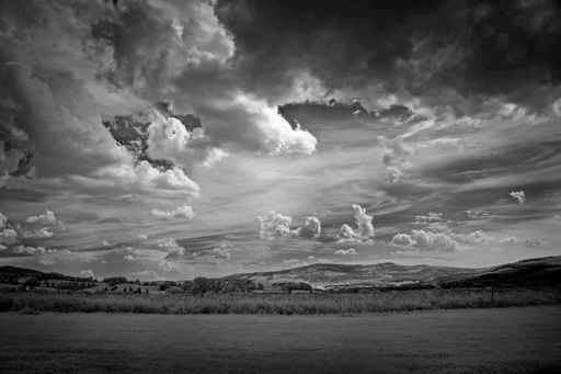 infra red photography of landscape with beautiful sky