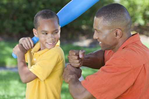 African American Man and Boy Father & Son Playing Baseball
